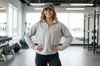 Female model in Womens Quarter Zip and Petrol Blue Cap