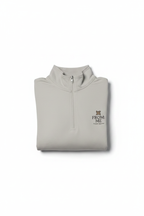 Folded beige pullover with 'From Me' logo on a white background
