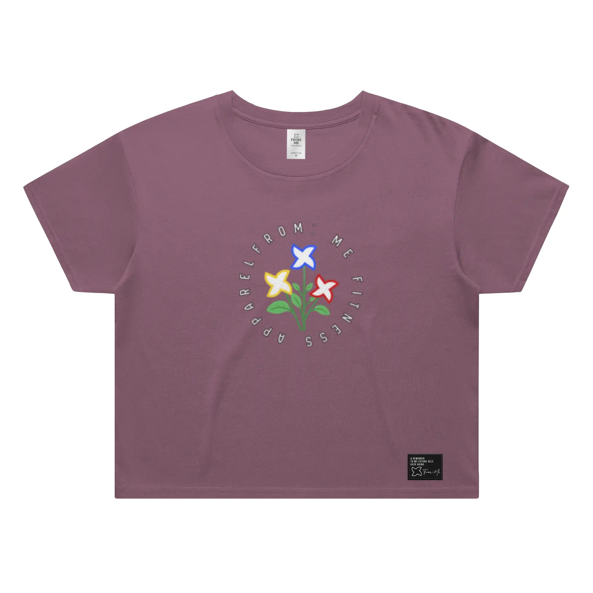 Purple t-shirt with floral graphic and text on a white background