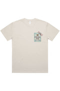 A light beige short-sleeve t-shirt with a graphic print on the left chest. The graphic features a light blue ticket stub with the text 'FROM: ME' and a small red and black stamp.